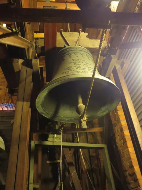 A church bell in a tower