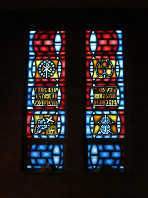 Stained-glass windows in a dark church