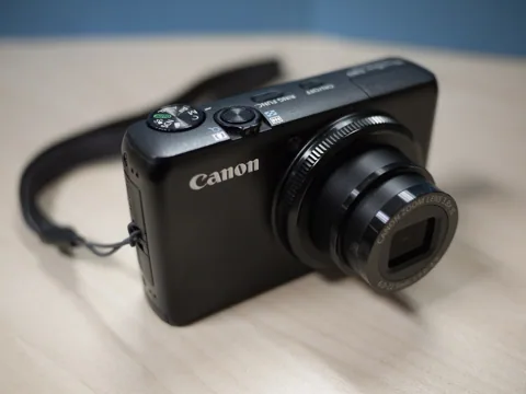 The S90 from an angle, with its wrist strap.