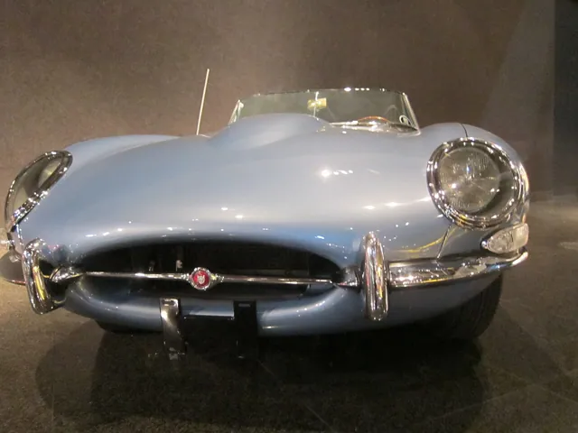 A car in a dim museum