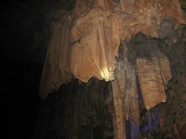 A cave, lit by one burst