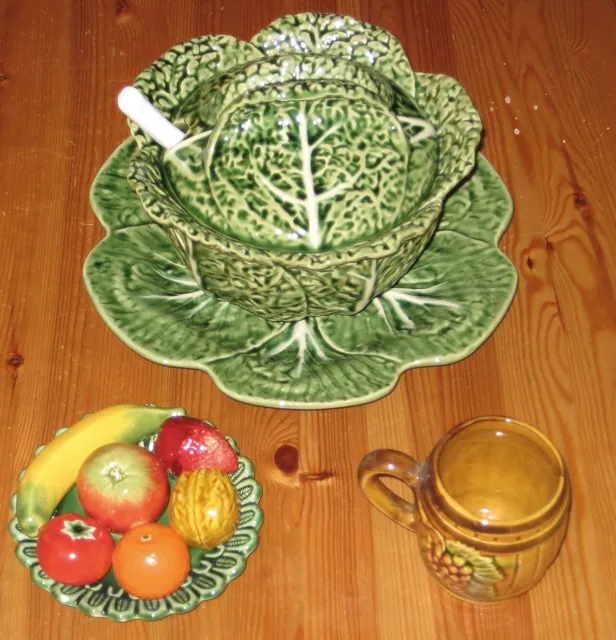 Fruit and a tureen on a wooden table