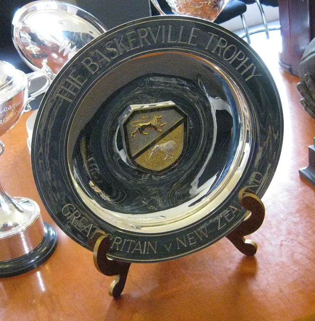 A silver trophy under indoor light