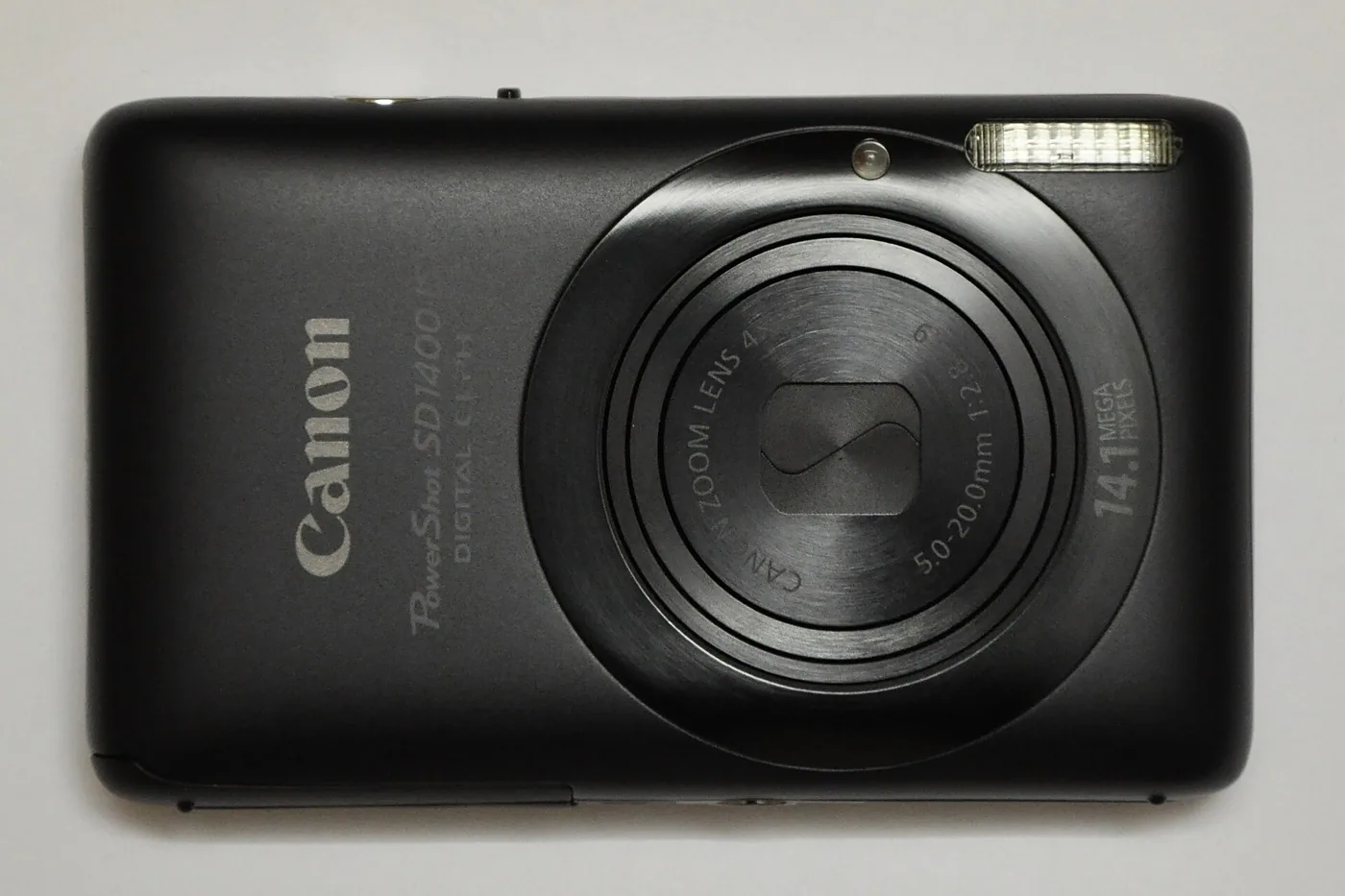 The Canon PowerShot SD1400 IS in black, seen from the front.