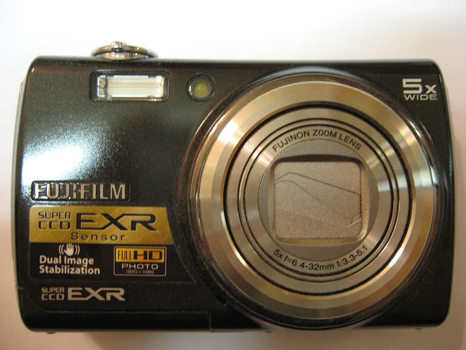 The Fujifilm FinePix F200EXR in black, front view, showing the Super CCD EXR badge.