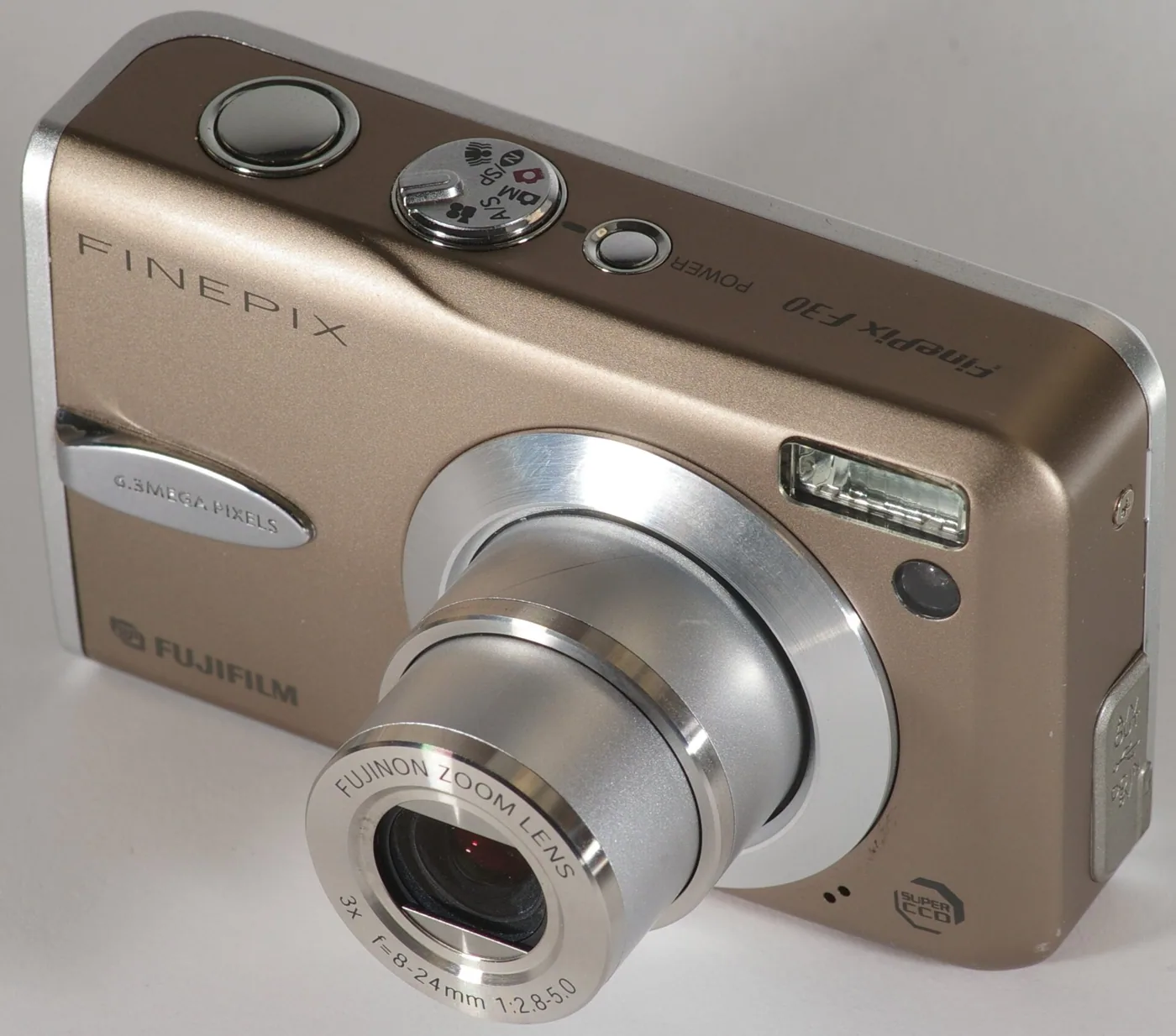 The Fujifilm FinePix F30 with its Fujinon zoom lens extended.