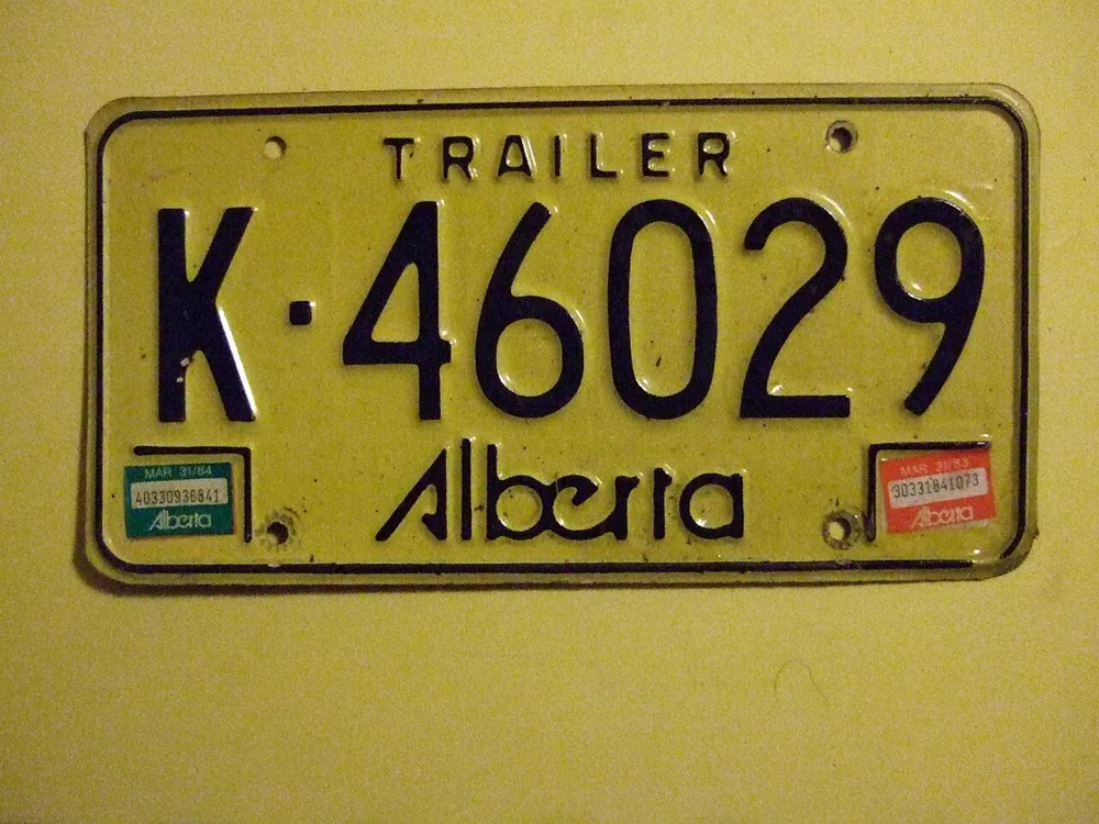 The top rung: a licence plate photographed at the camera's maximum sensitivity.