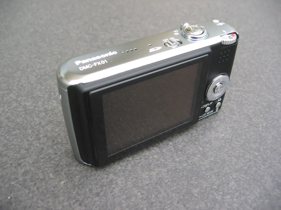 The Panasonic Lumix DMC-FX01 in black, seen from the front.