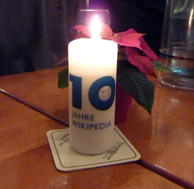 A candle on a table