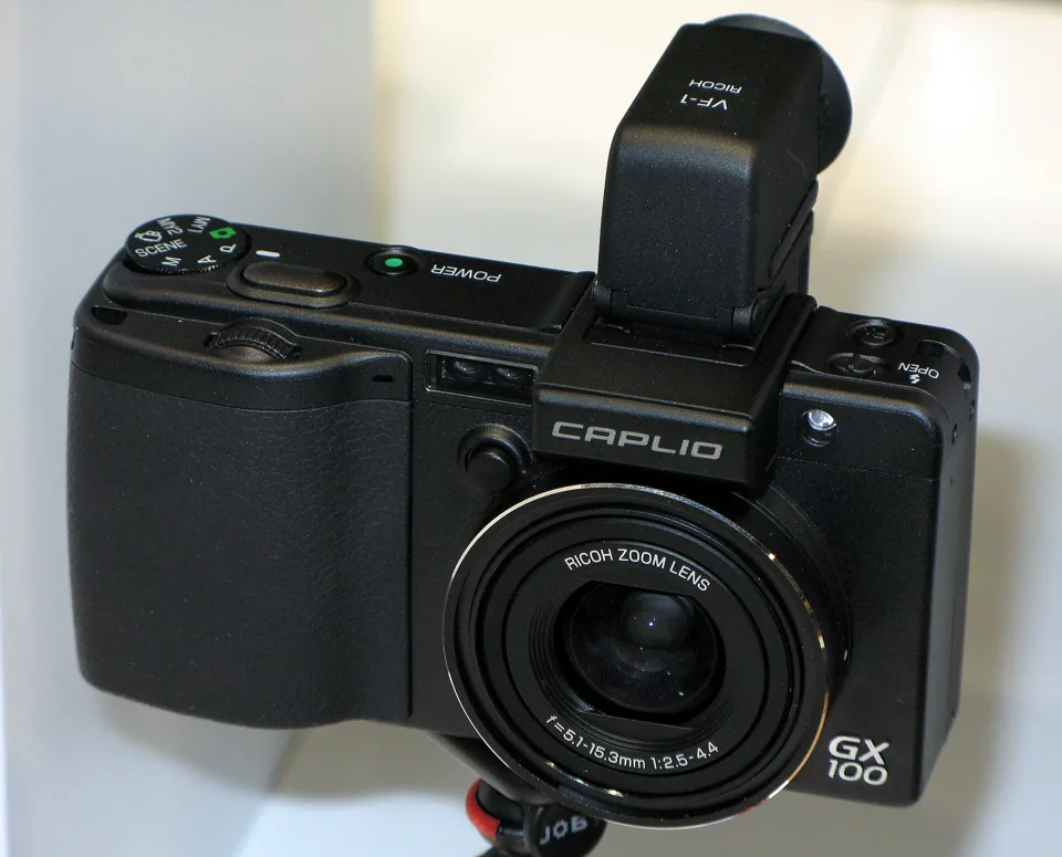 With the optional VF-1 electronic viewfinder in the hot shoe.