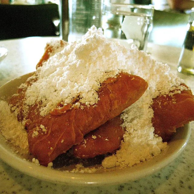 Beignets under powdered sugar