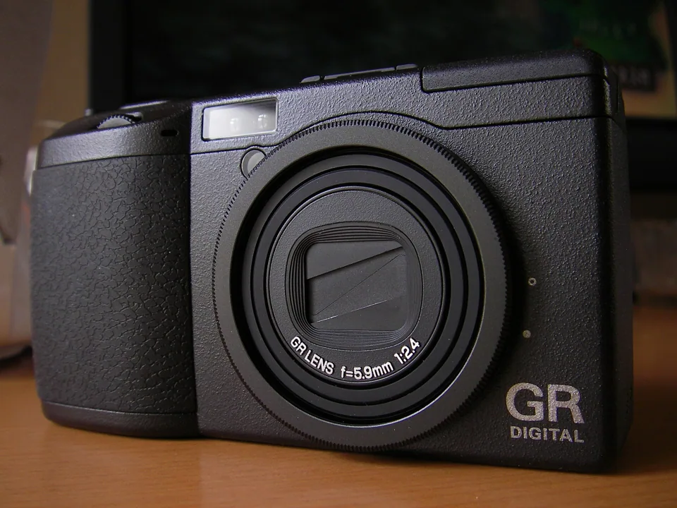 The Ricoh GR Digital, front view, with its f/2.4 GR lens.