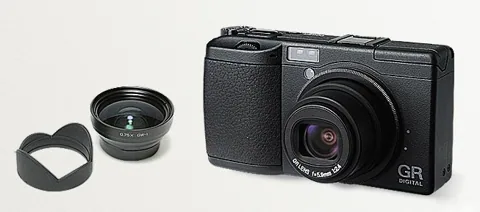 A GR Digital with its lens hood and converter.