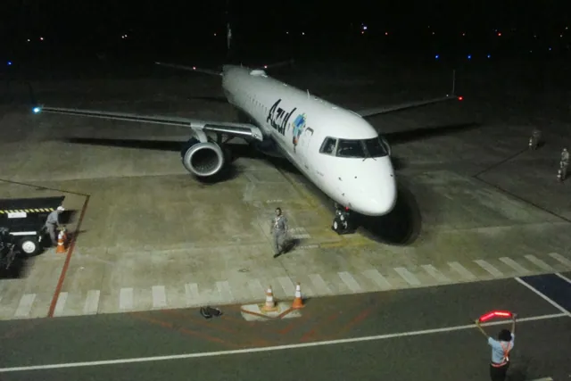 An airliner on a night apron