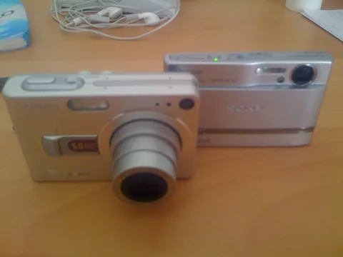 A silver T9 next to a Casio EX-Z50.