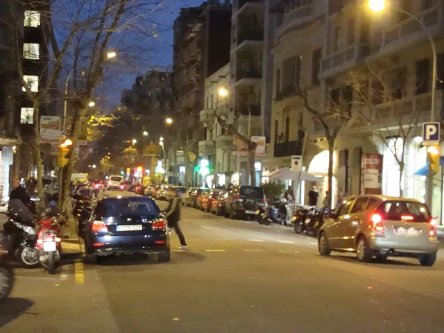 A lit city street at night