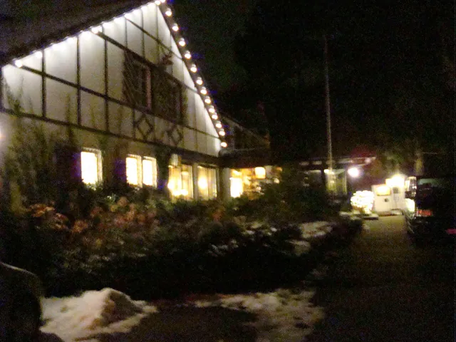 A lit house at night